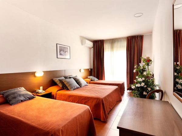 Hotel Corolle : photo 1 de la chambre chambre quadruple