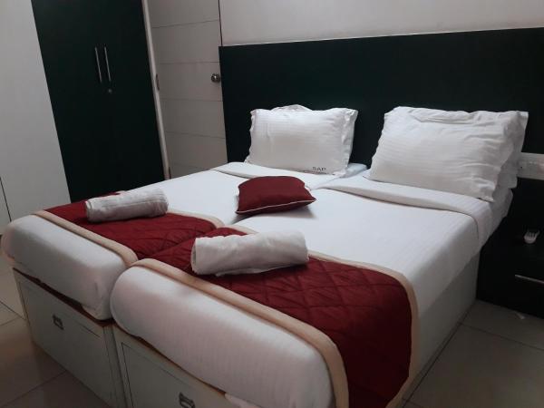 SAP Golden Grande Electronic City : photo 2 de la chambre chambre double standard