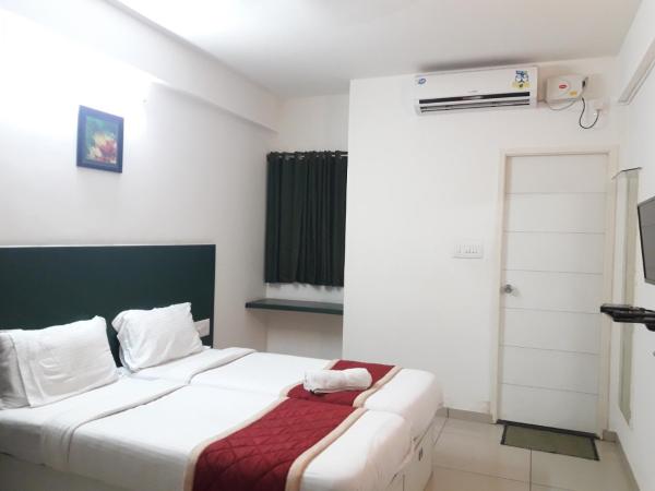 SAP Golden Grande Electronic City : photo 3 de la chambre chambre double standard