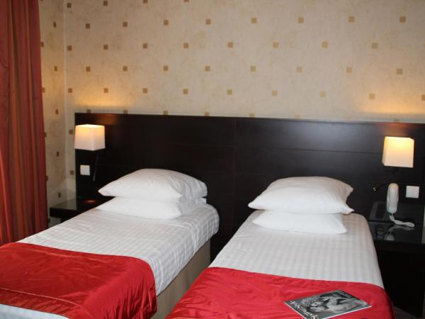 Hôtel de l'Exposition - Tour Eiffel : photo 1 de la chambre chambre double ou lits jumeaux supérieure