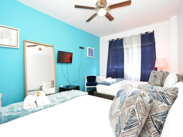 South Beach Rooms and Hostel : photo 5 de la chambre chambre privée avec 2 lits doubles