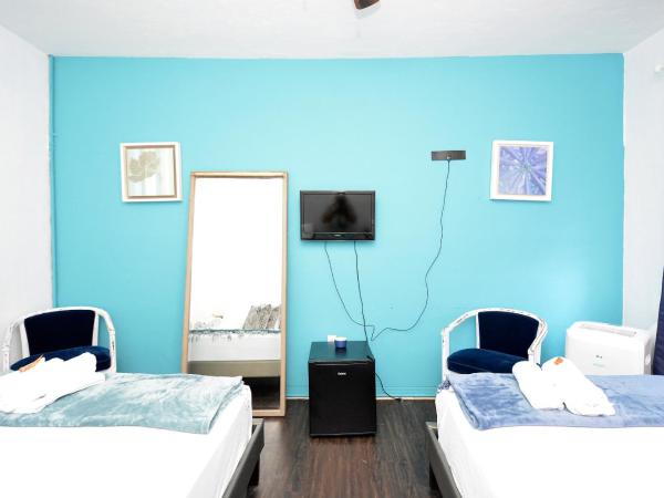 South Beach Rooms and Hostel : photo 4 de la chambre chambre privée avec 2 lits doubles