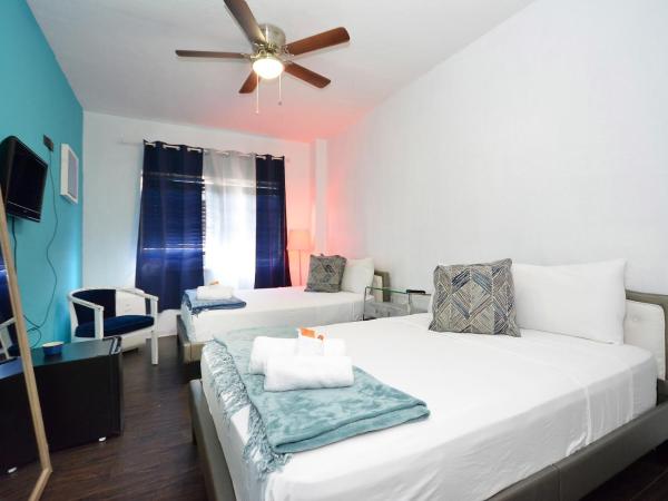 South Beach Rooms and Hostel : photo 2 de la chambre chambre privée avec 2 lits doubles
