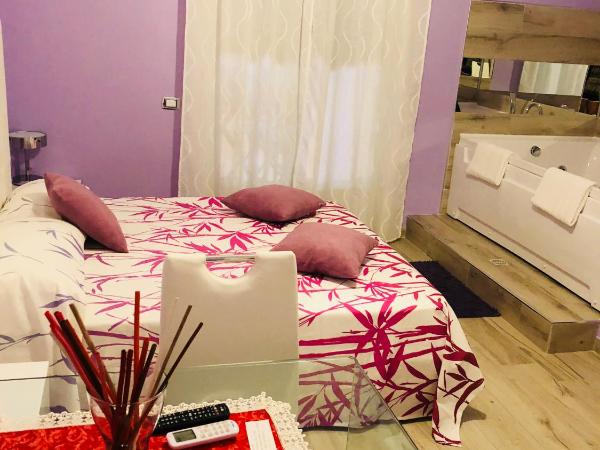 al Corso 203 : photo 9 de la chambre chambre lit king-size avec baignoire spa