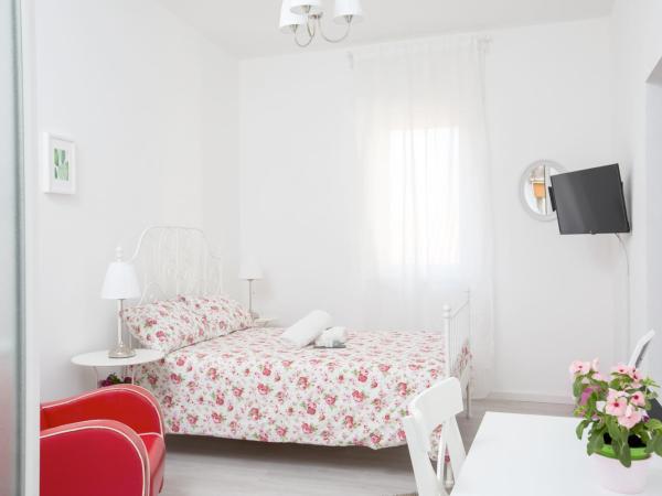 Maison Ortigia : photo 3 de la chambre chambre triple deluxe