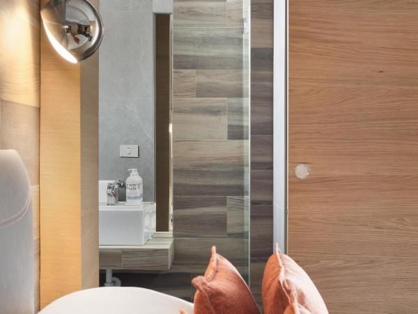 Bio Boutique Hotel XU' - Gruppo Ambienthotels : photo 8 de la chambre chambre deluxe double ou lits jumeaux