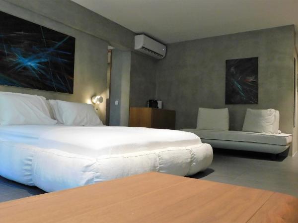 101 Adrianou Apartments : photo 4 de la chambre suite supérieure - vue sur jardin