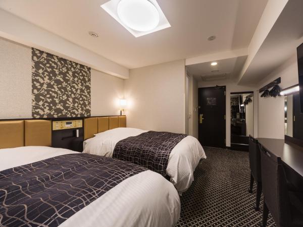 APA Hotel & Resort Nishishinjuku-Gochome-Eki Tower : photo 3 de la chambre chambre lits jumeaux - non-fumeurs