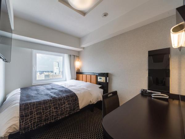 APA Hotel & Resort Nishishinjuku-Gochome-Eki Tower : photo 3 de la chambre chambre avec petit lit double - vue sur ville - Étage supérieur - non-fumeurs