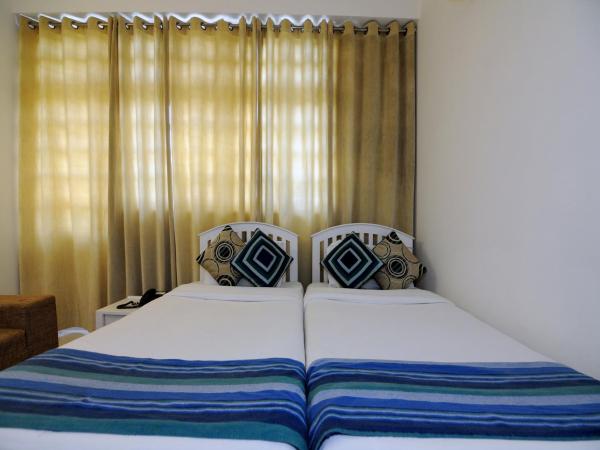 Mehra Residency at The Airport : photo 10 de la chambre chambre double ou lits jumeaux standard