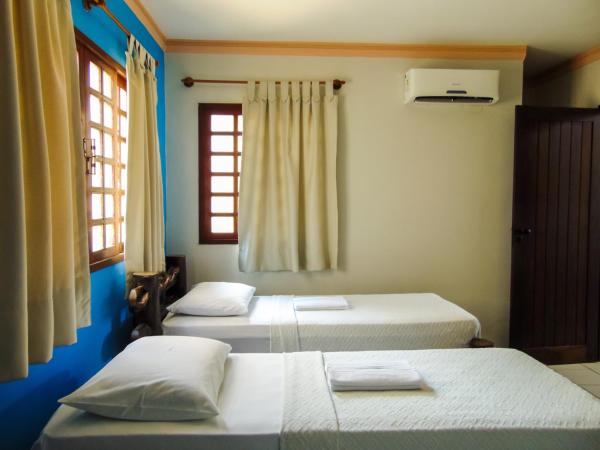 Chalés Aguaí : photo 5 de la chambre chalet (3 lits simples)