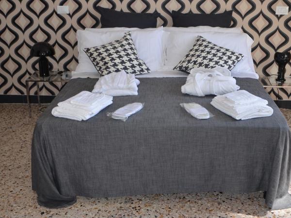 Le coccole : photo 9 de la chambre chambre double avec salle de bains privative