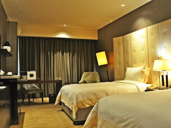 Royal International Hotel Shanghai - Pudong International Airport : photo 3 de la chambre chambre deluxe double ou lits jumeaux