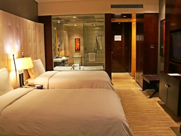 Royal International Hotel Shanghai - Pudong International Airport : photo 6 de la chambre chambre deluxe double ou lits jumeaux
