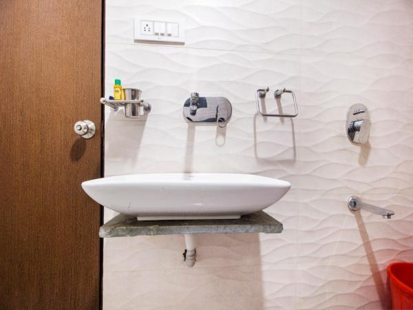 FabExpress Travelers Lodge : photo 1 de la chambre chambre double deluxe