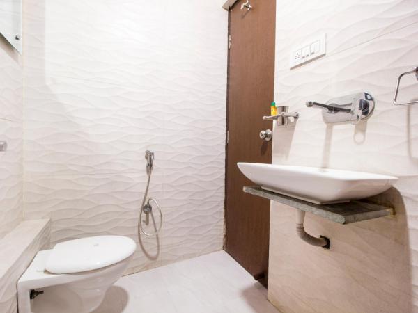 FabExpress Travelers Lodge : photo 4 de la chambre chambre double supérieure