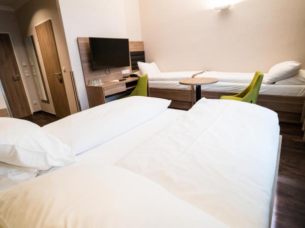 Hotel Marc Aurel - Newly refurbished : photo 1 de la chambre chambre quadruple