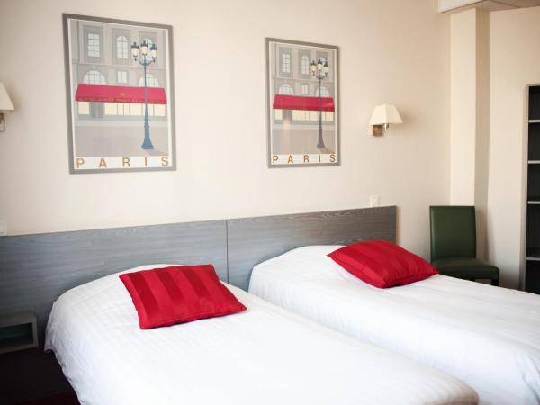 Hôtel Carmin : photo 5 de la chambre chambre lits jumeaux