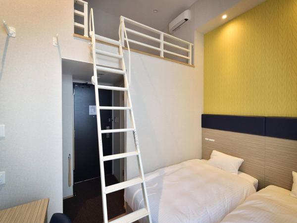 Hotel WBF Grande Hakata : photo 2 de la chambre chambre lits jumeaux exécutive