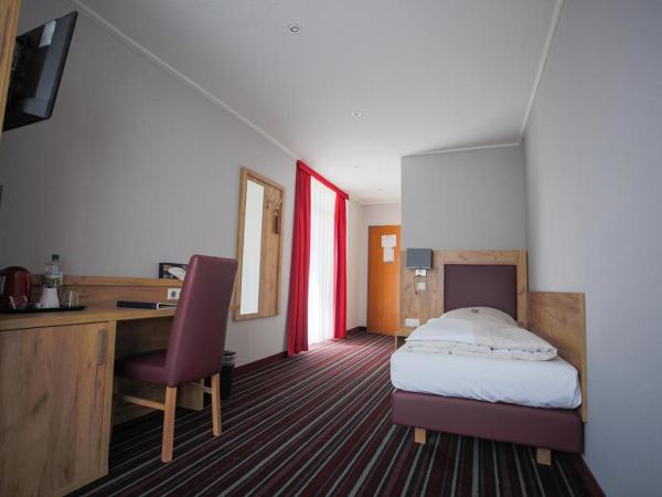 Hotel Süderelbe : photo 1 de la chambre chambre simple