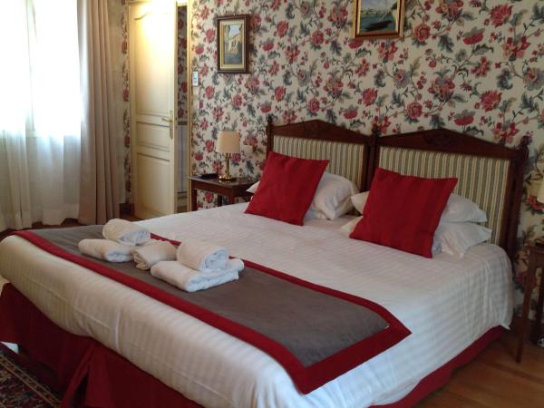 Best Western Hôtel De France : photo 1 de la chambre suite lit king-size avec baignoire