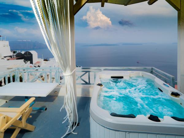 Kaleidoscope Cave Houses : photo 1 de la chambre studio avec bain à remous extérieur - vue sur caldeira