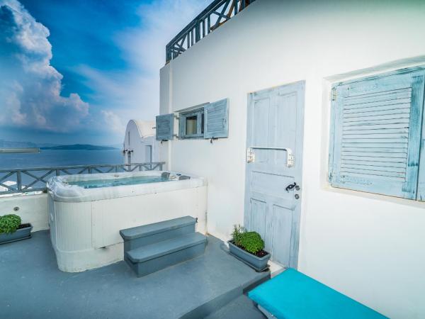 Kaleidoscope Cave Houses : photo 1 de la chambre maison troglodyte 2 chambres avec bain à remous extérieur - vue sur caldeira