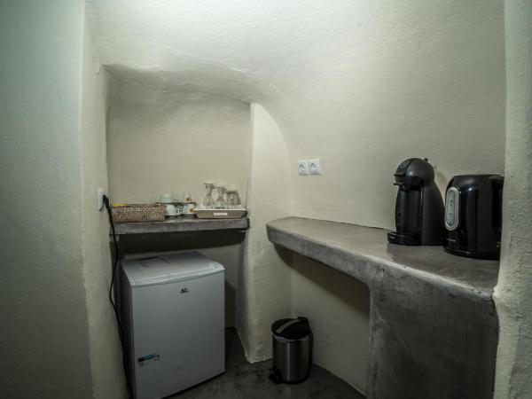 Kaleidoscope Cave Houses : photo 9 de la chambre maison troglodyte 1 chambre avec bain à remous extérieur - vue sur caldeira