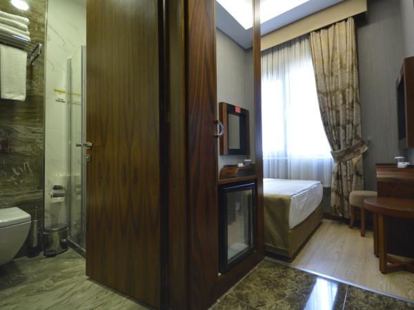 Piya Sport Hotel : photo 1 de la chambre petite chambre simple