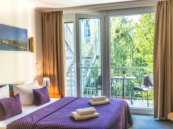 Hotel Ambiente Berlin City : photo 2 de la chambre chambre triple