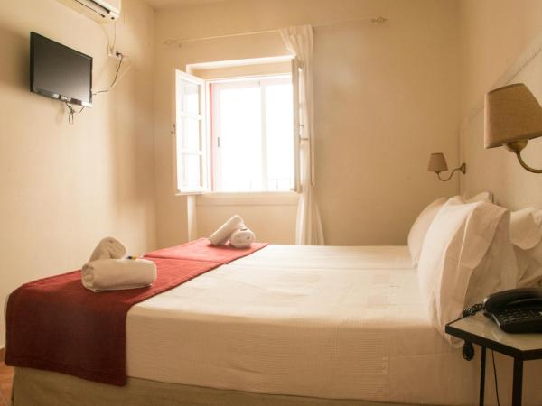 Hostal Callejon del Agua : photo 2 de la chambre chambre deluxe double ou lits jumeaux