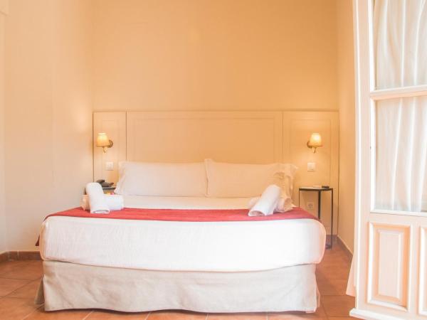 Hostal Callejon del Agua : photo 9 de la chambre chambre deluxe double ou lits jumeaux