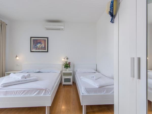 Villa Gloria : photo 6 de la chambre chambre triple