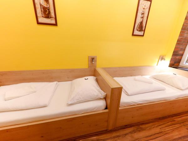 Do Step Inn Home - Hotel & Hostel : photo 5 de la chambre chambre lits jumeaux