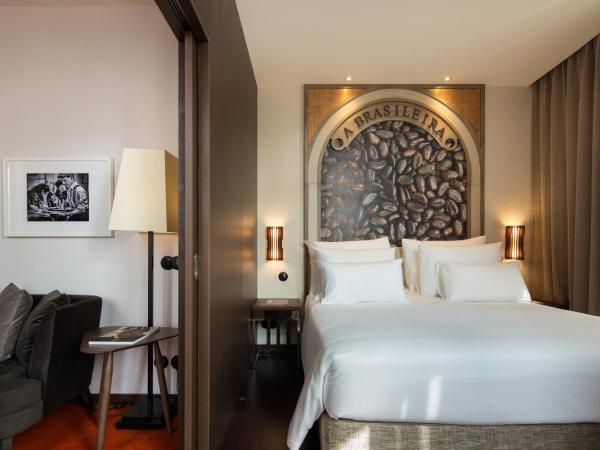 Pestana Porto - A Brasileira, City Center & Heritage Building : photo 1 de la chambre suite triple 