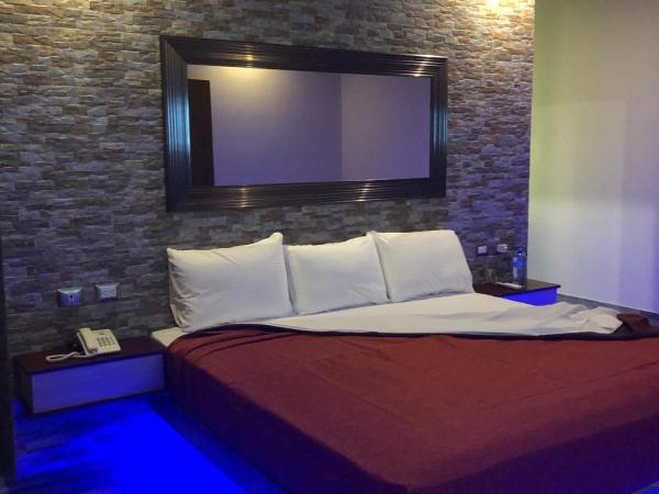 Hotel Plaza Arteaga : photo 1 de la chambre suite deluxe avec lit king-size