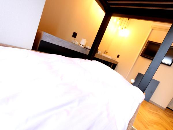 Hotel 3 O'Clock Tennoji : photo 7 de la chambre chambre quadruple avec salle de bains privative