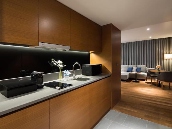 Novotel Ambassador Seoul Dongdaemun Hotels & Residences : photo 3 de la chambre chambre lit king-size deluxe résidence