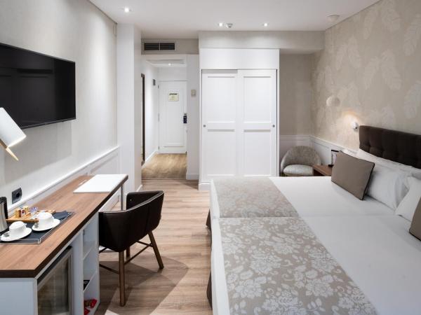 Catalonia Puerta del Sol : photo 3 de la chambre chambre familiale (2 adultes et 2 enfants)