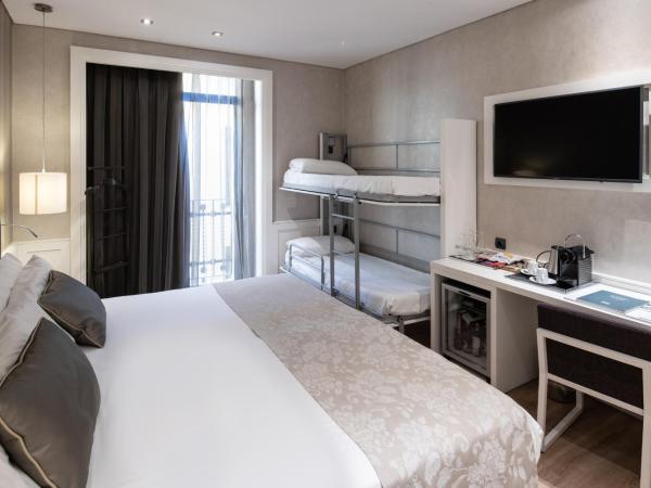 Catalonia Puerta del Sol : photo 2 de la chambre chambre familiale (2 adultes et 2 enfants)