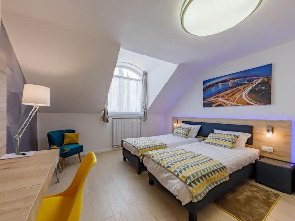 Christina Residence : photo 8 de la chambre chambre deluxe double ou lits jumeaux