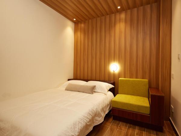 Shanghai Meego Qingwen Hotel : photo 3 de la chambre chambre double avec salle de bains privative sans fenêtre