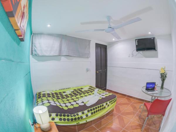 Hotel San Carlos : photo 3 de la chambre chambre deluxe (2 adultes + 1 enfant)