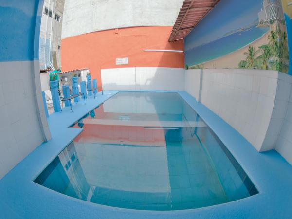 Hotel San Carlos : photo 1 de la chambre chambre deluxe (2 adultes + 1 enfant)