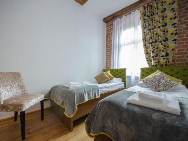 Apartamenty Mieszczańskie u Gołębiewskich : photo 7 de la chambre chambre lits jumeaux spacieuse