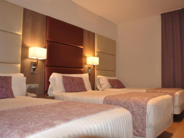 Hotel Selu : photo 2 de la chambre chambre lits jumeaux avec lit d’appoint - 301
