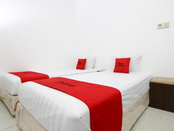 RedDoorz near Adisucipto Airport 3 : photo 4 de la chambre chambre lits jumeaux deluxe