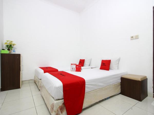 RedDoorz near Adisucipto Airport 3 : photo 2 de la chambre chambre lits jumeaux deluxe