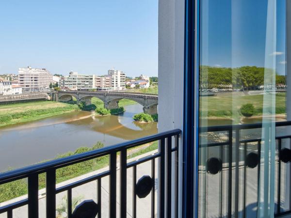 Hotel & Spa Vacances Bleues Le Splendid : photo 4 de la chambre chambre double ou lits jumeaux - vue sur canal