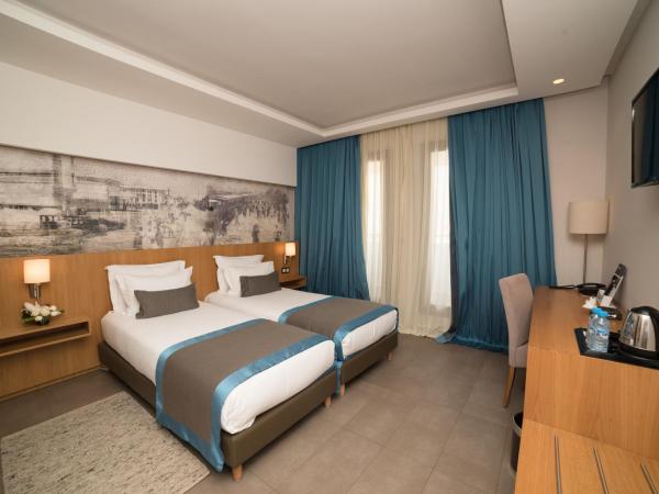 ONOMO Hotel Rabat Terminus : photo 4 de la chambre chambre lits jumeaux confort